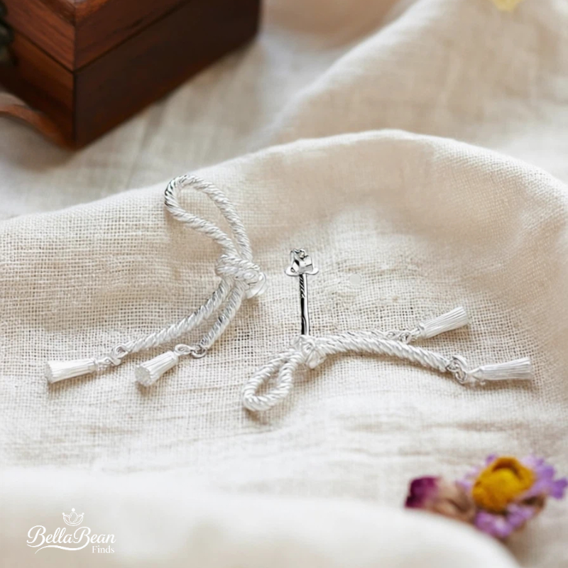 The Silver Sway: Fluid Knot & Tassel Earrings in Solid 925 Sterling Silver